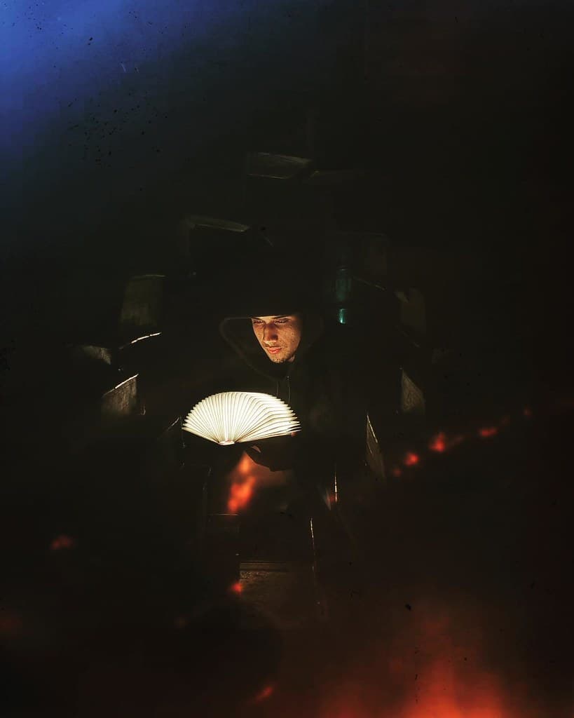 A photo of AP holding a Book Inpired Lamp